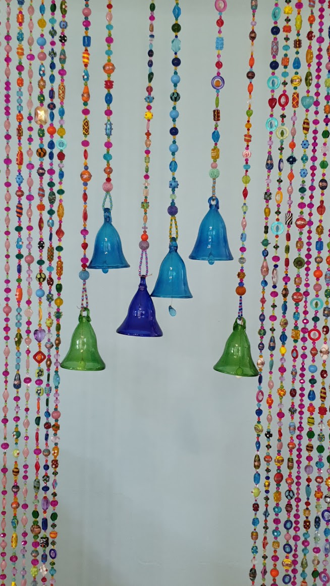 Glass-Blown Bell On Beaded String