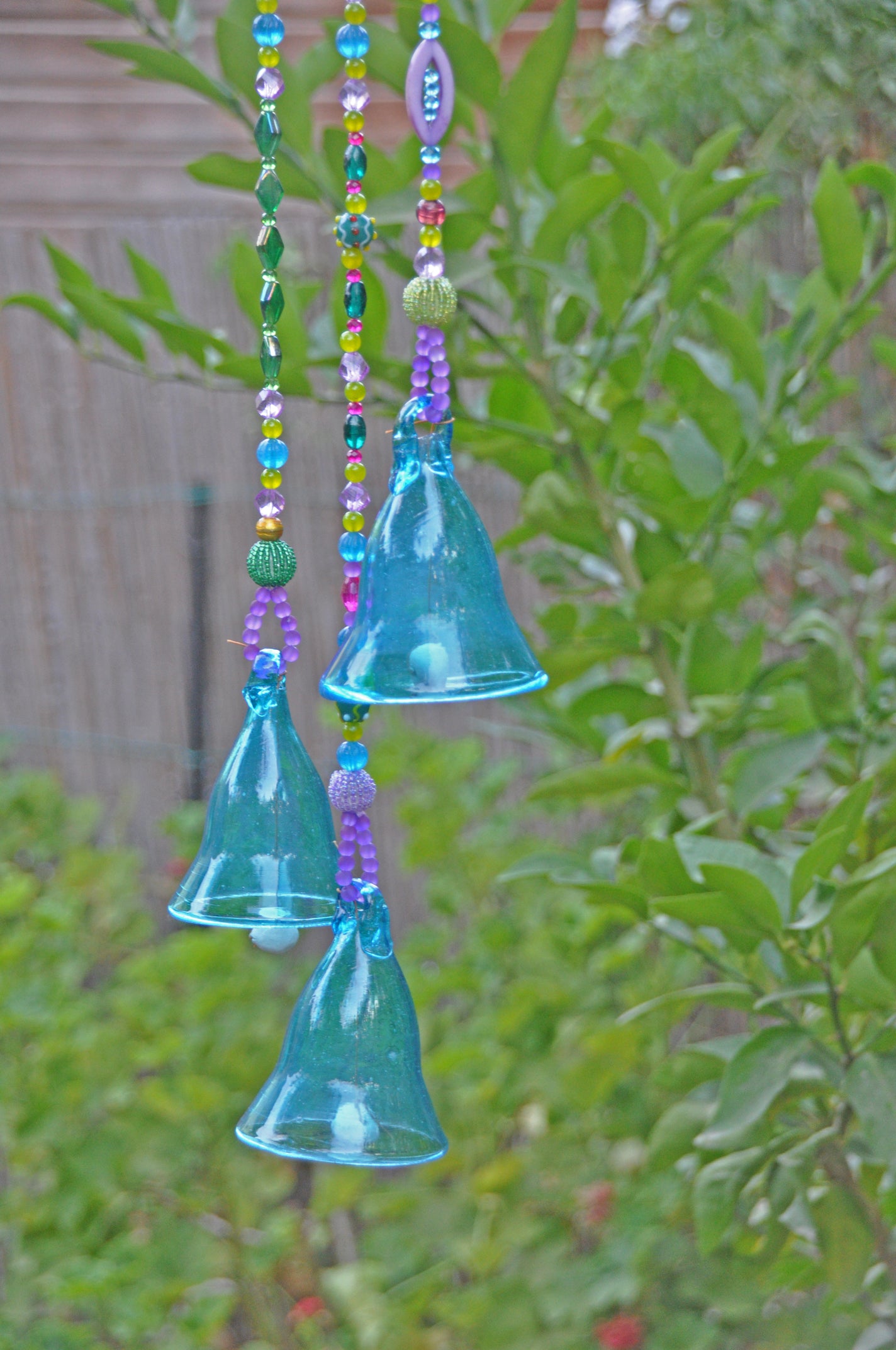 Glass-Blown Bell On Beaded String