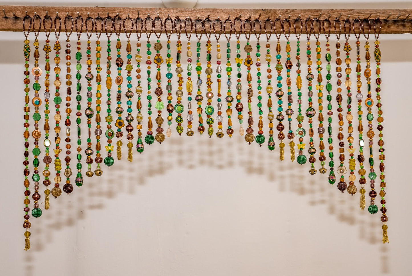 Beaded Valance in shadows of Green, Yellow, Brown, and touches of gold