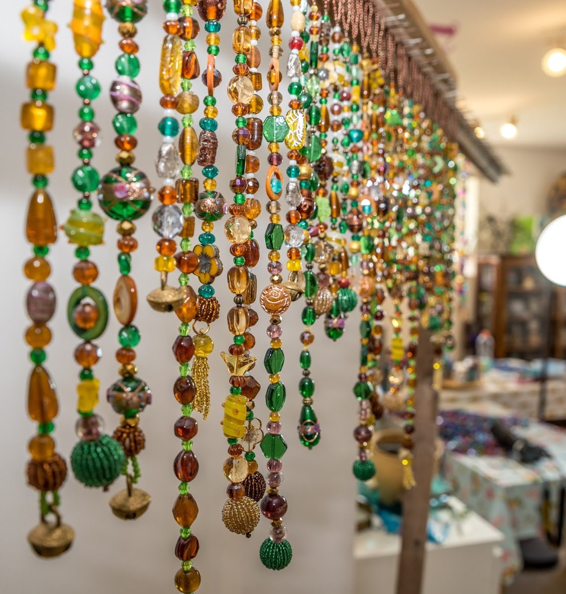 Beaded Valance in shadows of Green, Yellow, Brown, and touches of gold
