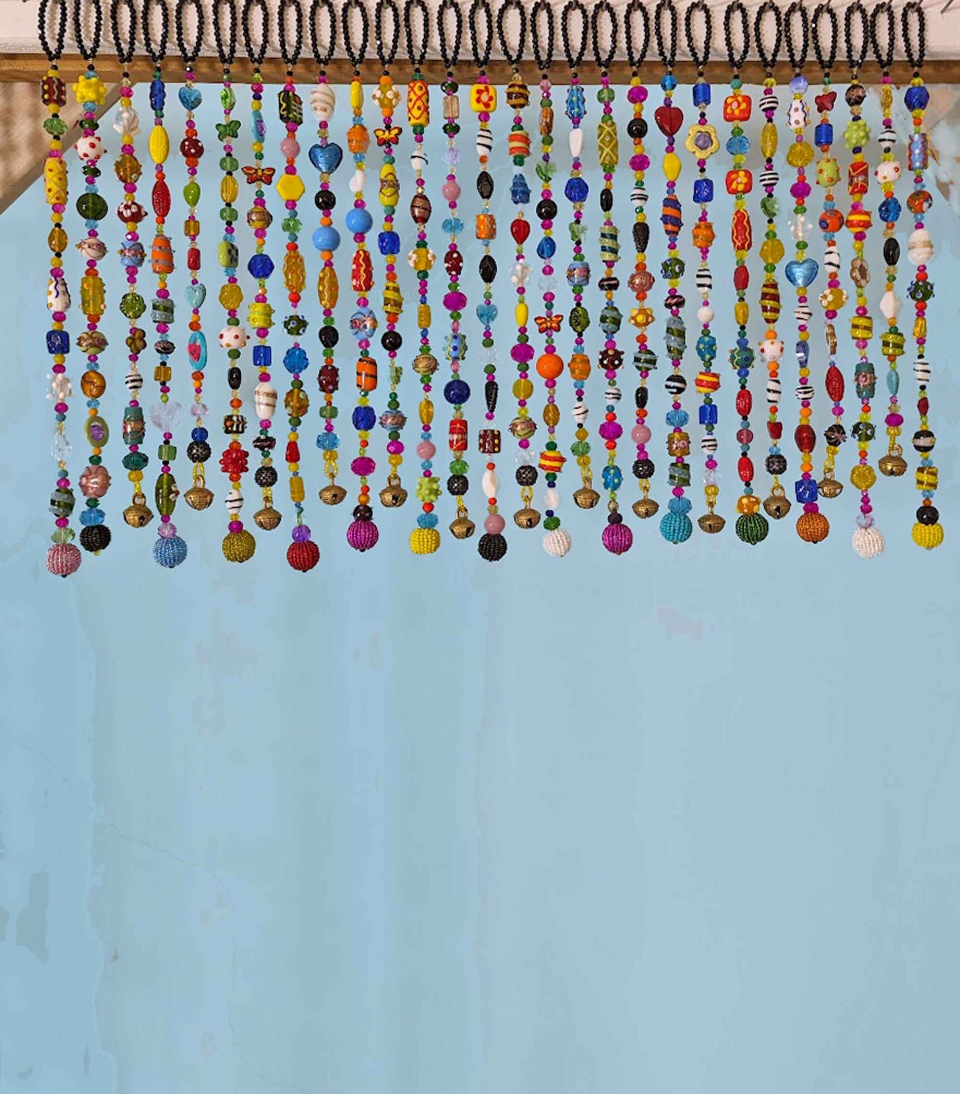 rainbow beaded curtain strands with brass bells handmade boho decor