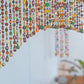 Beaded Valance in shadows of Green, Yellow, Brown, and touches of gold and copper and orange