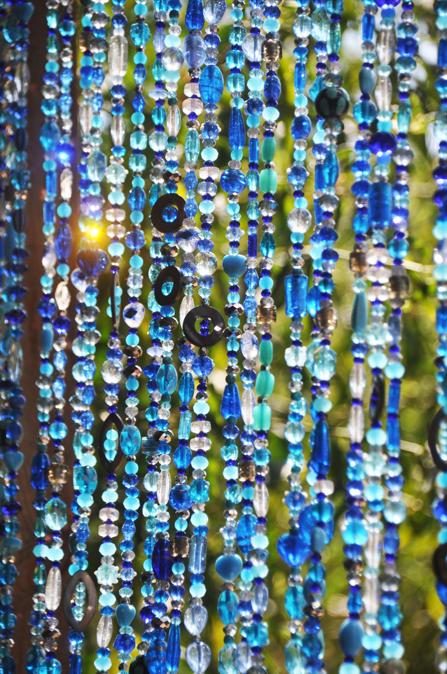 Beaded window Curtain in Shadows of Blue Turquoise Transparent and Grey