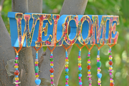 Bohemian Colorful Handmade Welcome Sign With Brass Bells and fabric tassels