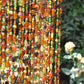 Beaded Curtain In Shadows of Brown Amber and Gold with touches of green