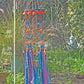 Fuchsia Turquoise and Orange Beaded Wind Chime with Fabric Tassels