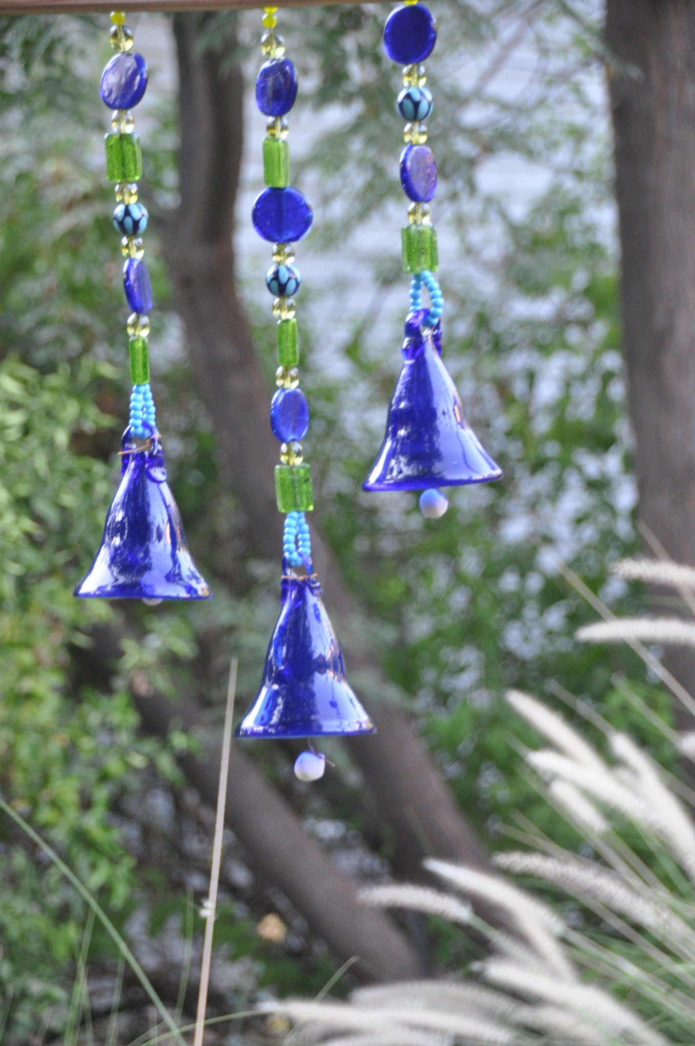 Three Blue Glass-Blown Bells On Beaded String