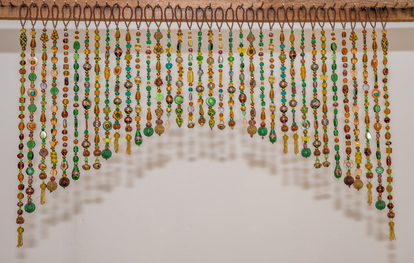 Beaded Valance in shadows of Green, Yellow, Brown, and touches of gold