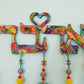 Colorful Handmade Love - אהבה - wall hanging, Hebrew letter Sign With Brass Bells and Fabric Tassels