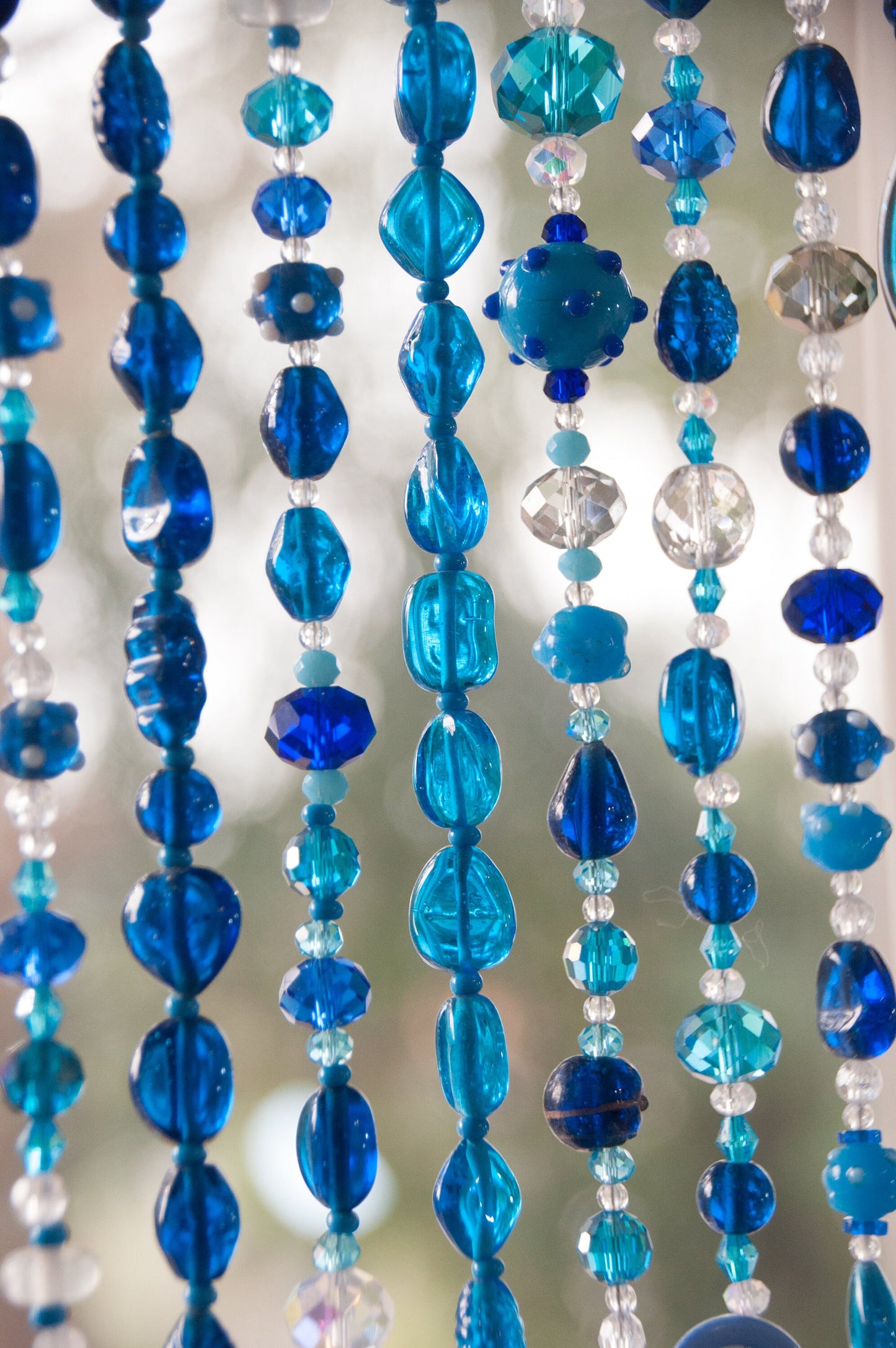 Blue,Turquoise, and Transperent Shades Beaded Curtain