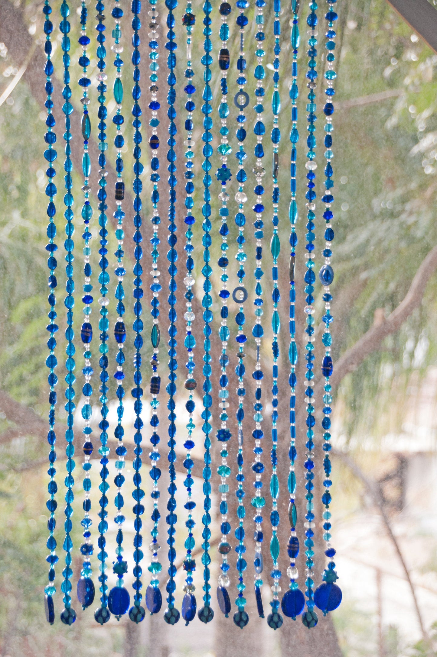 Blue,Turquoise, and Transperent Shades Beaded Curtain