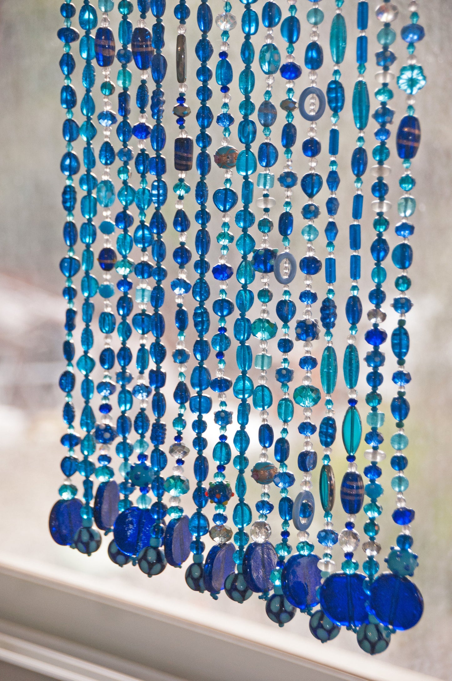 Blue,Turquoise, and Transperent Shades Beaded Curtain